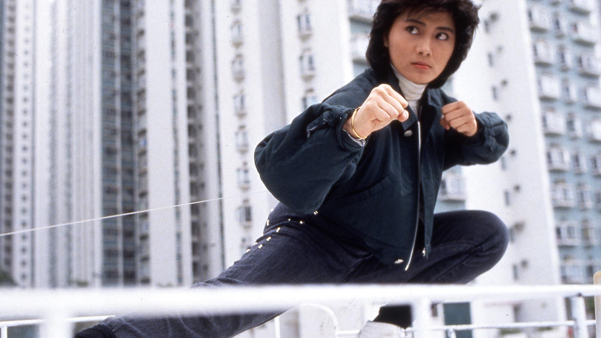 Cynthia Khan strikes a fierce pose, ready to fight, in In the Line of Duty IV.
